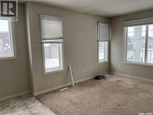 32 4533 Delhaye Way, Regina, SK - Indoor Photo Showing Other Room