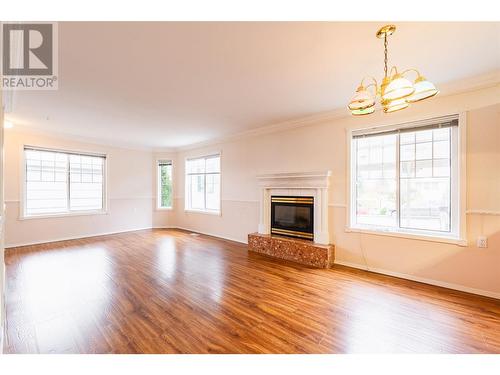 130 Chatham St Street Unit# 101, Nelson, BC - Indoor Photo Showing Living Room With Fireplace