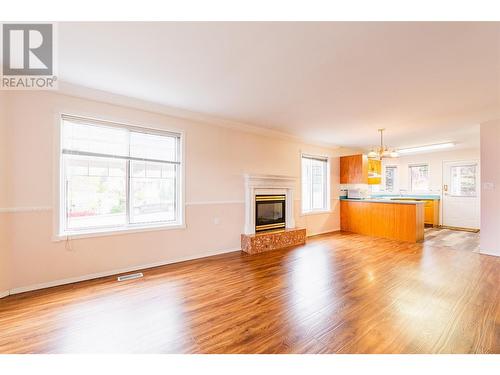 130 Chatham St Street Unit# 101, Nelson, BC - Indoor Photo Showing Living Room With Fireplace