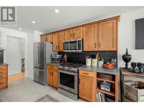 715 Barrera Road Unit# 8, Kelowna, BC - Indoor Photo Showing Kitchen With Stainless Steel Kitchen