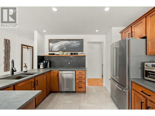 715 Barrera Road Unit# 8, Kelowna, BC - Indoor Photo Showing Kitchen With Stainless Steel Kitchen With Double Sink