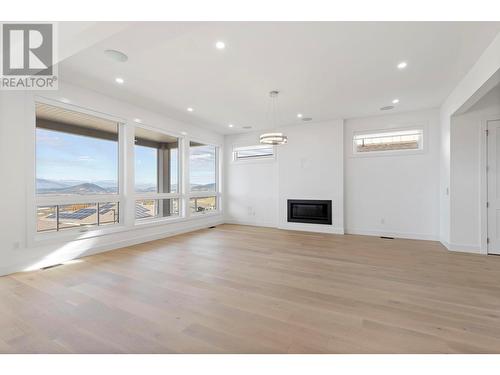 2193 Kentucky Crescent, Kelowna, BC - Indoor Photo Showing Other Room With Fireplace