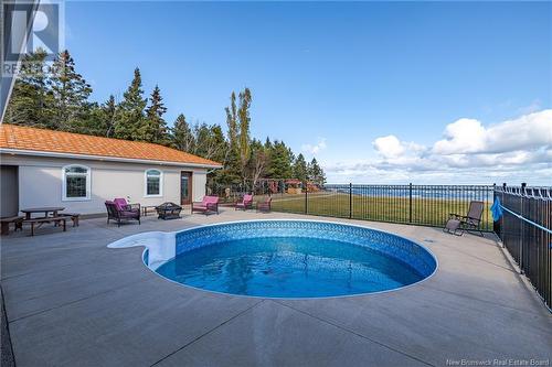 1602 Queen Elizabeth Drive, Bathurst, NB - Outdoor With In Ground Pool With Backyard