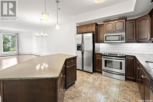 131 623 Saskatchewan Crescent W, Saskatoon, SK - Indoor Photo Showing Kitchen With Stainless Steel Kitchen With Double Sink With Upgraded Kitchen