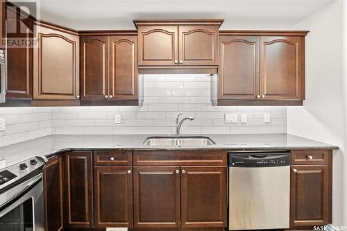 131 623 Saskatchewan Crescent W, Saskatoon, SK - Indoor Photo Showing Kitchen With Stainless Steel Kitchen With Double Sink