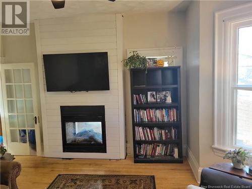 59 Boyd, Salisbury, NB - Indoor Photo Showing Other Room With Fireplace