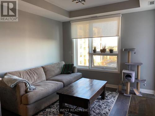 403 - 1105 Leger Way, Milton, ON - Indoor Photo Showing Living Room