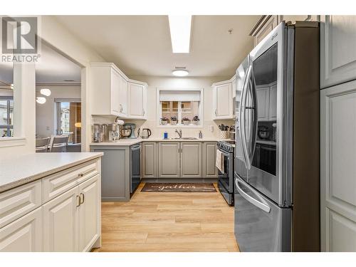 1967 Underhill Street Unit# 307, Kelowna, BC - Indoor Photo Showing Kitchen With Double Sink