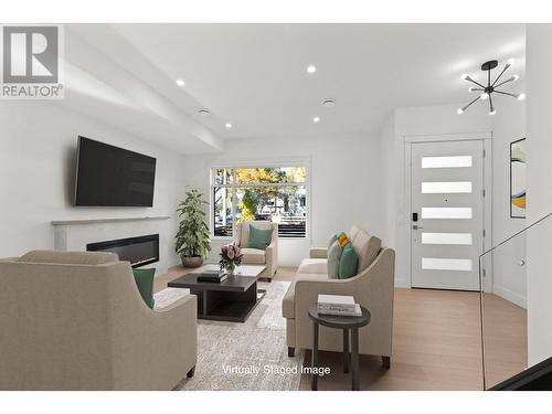 747 Fuller Avenue Unit# 2, Kelowna, BC - Indoor Photo Showing Living Room With Fireplace