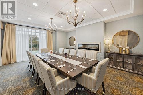 716 - 460 William Graham Drive, Aurora, ON - Indoor Photo Showing Dining Room With Fireplace