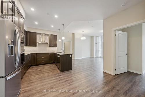 716 - 460 William Graham Drive, Aurora, ON - Indoor Photo Showing Kitchen With Upgraded Kitchen