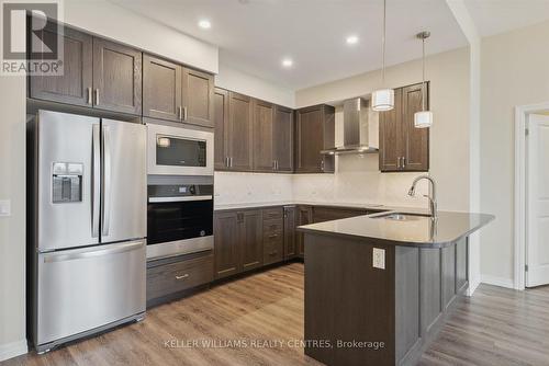 716 - 460 William Graham Drive, Aurora, ON - Indoor Photo Showing Kitchen With Stainless Steel Kitchen With Upgraded Kitchen