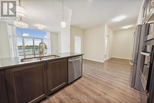 716 - 460 William Graham Drive, Aurora, ON - Indoor Photo Showing Kitchen With Stainless Steel Kitchen With Double Sink