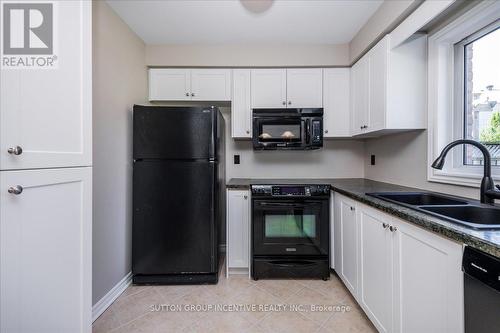 40 Livia Herman Way, Barrie, ON - Indoor Photo Showing Kitchen With Double Sink