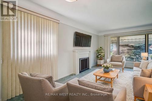 705 Glenforest Street, Oshawa, ON - Indoor Photo Showing Living Room With Fireplace