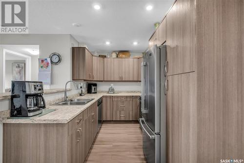 316 915 Kristjanson Road, Saskatoon, SK - Indoor Photo Showing Kitchen With Double Sink