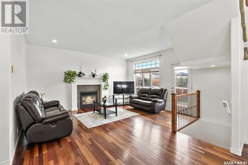 319 Stensrud Road, Saskatoon, SK - Indoor Photo Showing Living Room With Fireplace