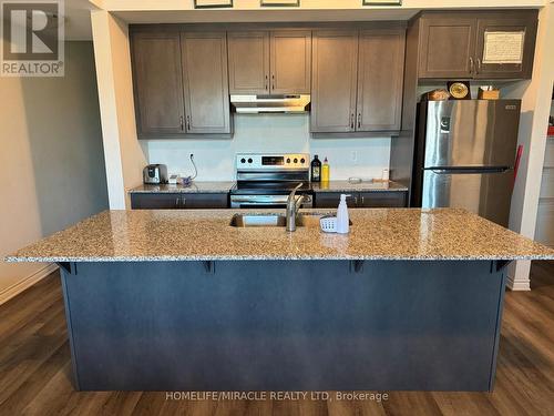 106 - 1034 Reflection Place, Pickering, ON - Indoor Photo Showing Kitchen With Stainless Steel Kitchen With Double Sink With Upgraded Kitchen