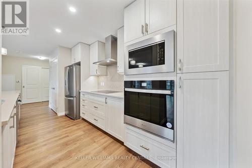 318 - 460 William Graham Drive, Aurora, ON - Indoor Photo Showing Kitchen With Stainless Steel Kitchen