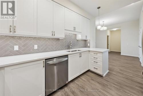 702 - 460 William Graham Drive, Aurora, ON - Indoor Photo Showing Kitchen With Double Sink