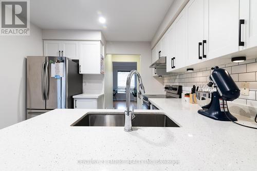 45 - 2 Clay Brick Court, Brampton, ON - Indoor Photo Showing Kitchen With Double Sink