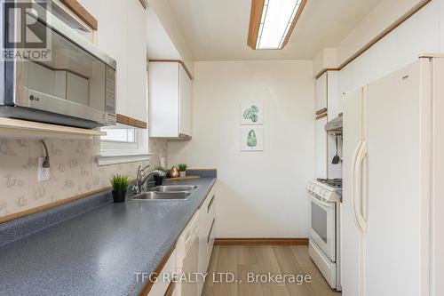 129 Bell Drive, Whitby (Lynde Creek), ON - Indoor Photo Showing Kitchen With Double Sink