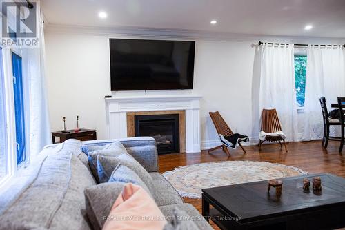 38 Citation Drive, Toronto, ON - Indoor Photo Showing Living Room With Fireplace