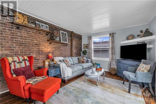 69 Beecher Street, Brockville, ON - Indoor Photo Showing Living Room With Fireplace