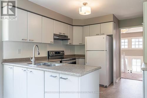 20 Frontier Avenue, Orillia, ON - Indoor Photo Showing Kitchen With Double Sink