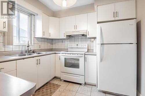 661 O'Connor Drive, Toronto, ON - Indoor Photo Showing Kitchen With Double Sink