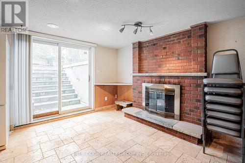 661 O'Connor Drive, Toronto, ON - Indoor Photo Showing Living Room With Fireplace