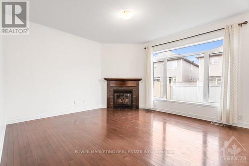 241 Dave Smith Crescent, Ottawa, ON - Indoor Photo Showing Other Room With Fireplace