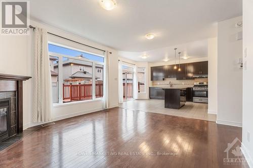 241 Dave Smith Crescent, Ottawa, ON - Indoor Photo Showing Living Room With Fireplace