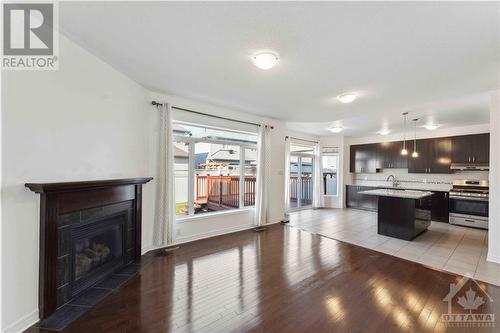 241 Dave Smith Crescent, Ottawa, ON - Indoor Photo Showing Living Room With Fireplace