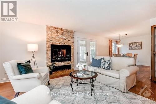 2 Kittansett Court, Ottawa, ON - Indoor Photo Showing Living Room With Fireplace