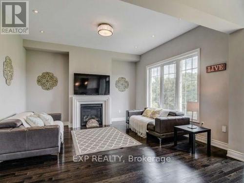 50 Sharonview Crescent, East Gwillimbury, ON - Indoor Photo Showing Living Room With Fireplace