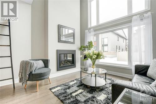 725 Twist Way, Ottawa, ON - Indoor Photo Showing Living Room With Fireplace