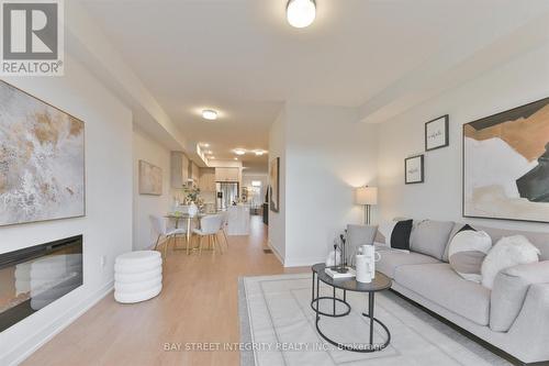 1820 Donald Cousens Parkway, Markham, ON - Indoor Photo Showing Living Room With Fireplace