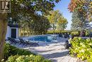 15886 Niagara River Parkway, Niagara-On-The-Lake, ON  - Outdoor With In Ground Pool With Deck Patio Veranda 