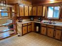 2013 Hepburn Drive, Fruitvale, BC  - Indoor Photo Showing Kitchen With Double Sink 