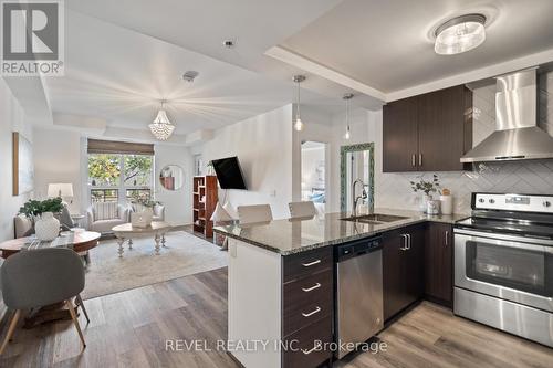 211 - 21 Brookhouse Drive, Clarington, ON - Indoor Photo Showing Kitchen With Upgraded Kitchen