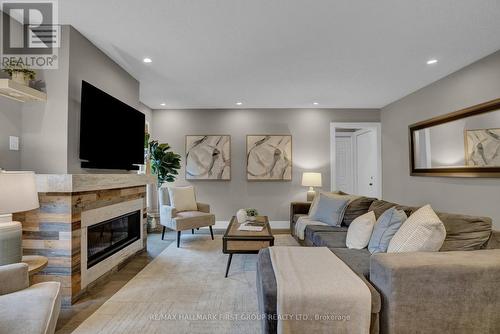 75 Ashbury Boulevard, Ajax, ON - Indoor Photo Showing Living Room With Fireplace