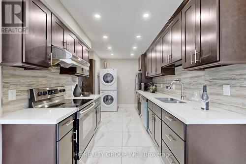 1 - 1000 Bridletowne Circle, Toronto, ON - Indoor Photo Showing Kitchen With Double Sink With Upgraded Kitchen