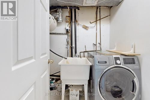 1 - 1000 Bridletowne Circle, Toronto, ON - Indoor Photo Showing Laundry Room