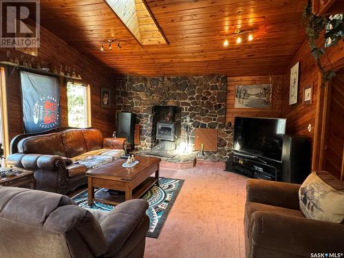 613 Niskemin Drive, Lac La Ronge, SK - Indoor Photo Showing Living Room With Fireplace