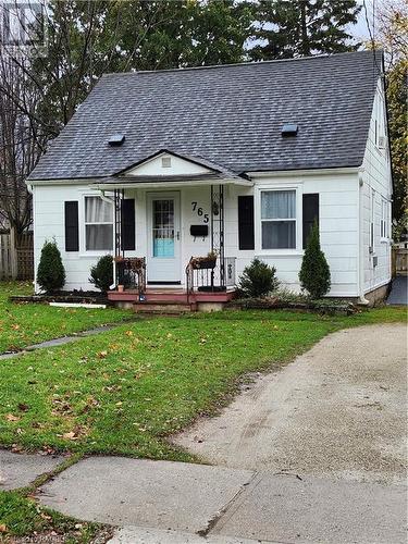 Single story home featuring a front yard and covered porch - 765 7Th Street A E, Owen Sound, ON - Outdoor With Deck Patio Veranda With Facade