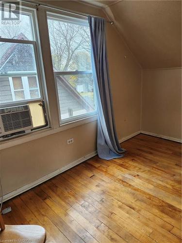 Additional living space featuring plenty of natural light, light wood-type flooring, and lofted ceiling - 765 7Th Street A E, Owen Sound, ON - Indoor Photo Showing Other Room