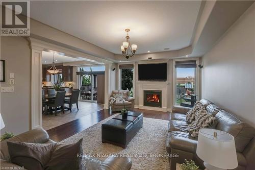 7178 St. Michael Avenue, Niagara Falls, ON - Indoor Photo Showing Living Room With Fireplace