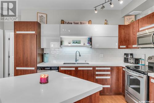 104 1015 Patrick Crescent, Saskatoon, SK - Indoor Photo Showing Kitchen With Stainless Steel Kitchen With Double Sink With Upgraded Kitchen