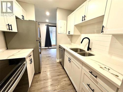 43 Taylor Avenue Unit# 103, Chatham, ON - Indoor Photo Showing Kitchen With Double Sink